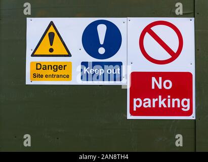 Keep out, no parking and danger signs  at a construction site Stock Photo
