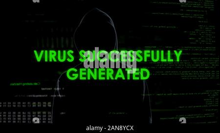 Virus successfully generated, man in black launching malware, secret data attack Stock Photo