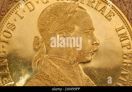 Portrait of Franz Joseph I on obverse of old gold Austrian four ducats coin. Stock Photo