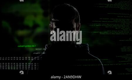 Anonymous internet male hacker with numbers and codes illustration background Stock Photo
