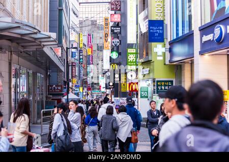 Myeongdong Shopping Street , mostly a commercial area, being one of Seoul's main shopping, parade route and tourism districts in Seoul, South Korea. Stock Photo