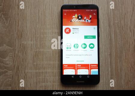 Retrica app on Google Play Store website displayed on Huawei Y6 2018 smartphone Stock Photo