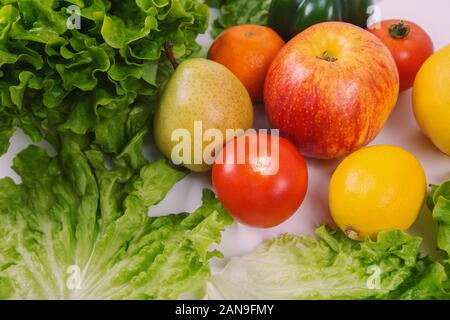 Close up of healthy bio food on the table. Organic fruits and vegetables from the farm garden. Bunch of fresh crop, no genetically modified cuisine. V Stock Photo