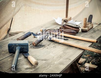 Old woodworking hand tool drawknife, drawshave, drawing knife, shaving  knifewooden in a carpentry workshop on dirty rustic table with old clay  Stock Photo - Alamy