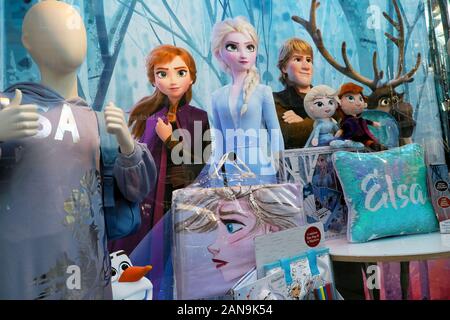 Disney characters from the film 'Frozen' in a department store window with merchandise products toys at Christmas time London England UK  KATHY DEWITT Stock Photo