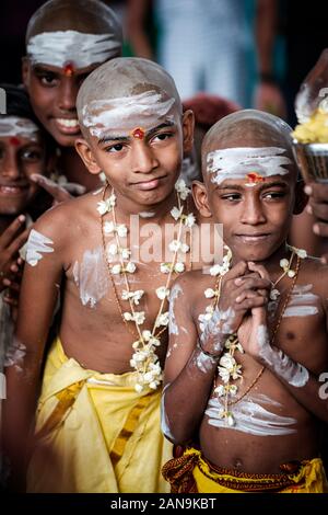 Batu Caves, Malaysia - January 21 2019 : Close-up of a group of young boy devotees in Thaipusam Festival.