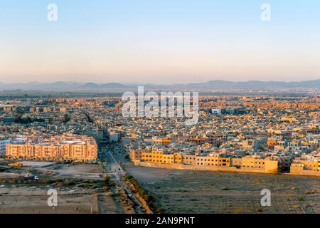 Aerial view of residential area of Marrakech with Atlas mountains on horizon, Morocco Stock Photo