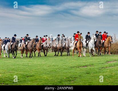 The Belvoir Hunt meeting in the Vale of Belvoir at Long Clawson, Leicestershire, England UK - The field following the hounds