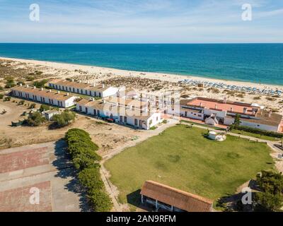 Famous Barril Beach with Tuna Museum, next to Tavira, Algarve, Portugal Stock Photo