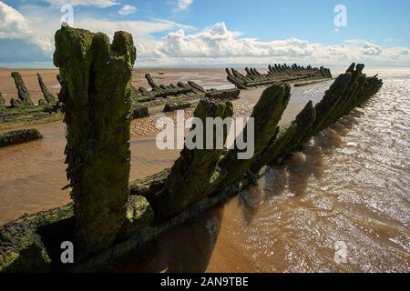 Wreck of the Norwegian barque SS Nornen - a feature of Berrow dunes near Burnham on Sea since it ran aground in 1897 - Somerset UK Stock Photo