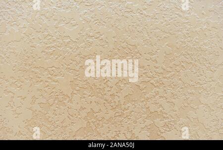 Beige seamless venetian stucco. Background and texture of decorative plaster. Stock Photo