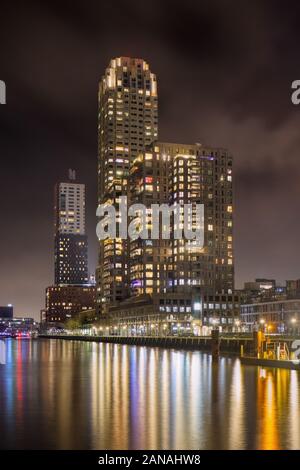 ROTTERDAM-DEC. 28, 2019. New Orleans tower reflected in a river  The 158 m building (design Álvaro Siza Vieira) is the tallest flat of The Netherlands. Stock Photo