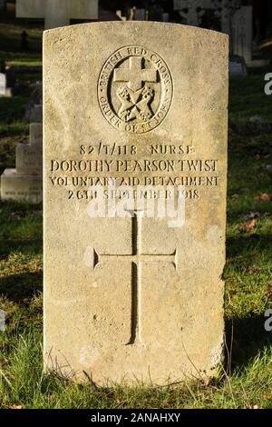 Grave of a nurse from the Voluntary Aid Detachment killed during world war one, UK, with emblem of the Order of St John and British Red Cross. Stock Photo