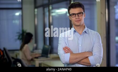 Confident young man posing on camera, applicant for vacancy, freelance job Stock Photo