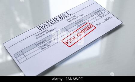 Final reminder seal stamped on water bill, payment for services, month expenses Stock Photo