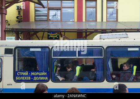 A bus waiting to leave from Lviv train station in Ukraine. Public transport is cheap and easy to use. Stock Photo