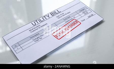 Utility bill final reminder, seal stamped on document, payment for services Stock Photo