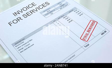 Final reminder seal stamped on invoice for serviced commercial document, bill Stock Photo