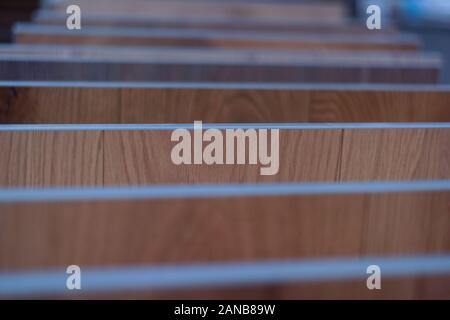 Wooden samples for floor laminate or furniture in home or commercial building for design. Wood texture floor Samples of laminate and vinyl. Stock Photo