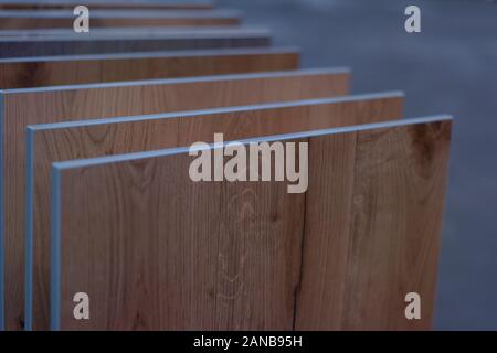 Wooden samples for floor laminate or furniture in home or commercial building for design. Wood texture floor Samples of laminate and vinyl. Stock Photo