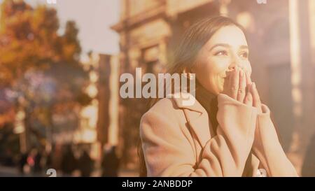 Extremely happy young lady feeling inspired, dream come true, new life beginning Stock Photo