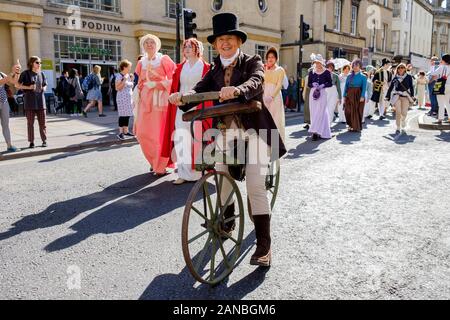 Jane Austen fans dressed in regency costumes are pictured taking part in the Jane Austen Festival  Regency Costumed Promenade.Bath,England,UK 14-09-19 Stock Photo