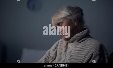 Aged woman sleeping closeup, nursing home leisure, retirement nap, tiredness Stock Photo