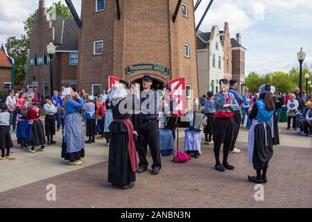 May 2, 2019, Pella, Iowa, USA. Folk dance in national dutch costume during the Tulip Time Festival Parade of Pella's dutch community Stock Photo