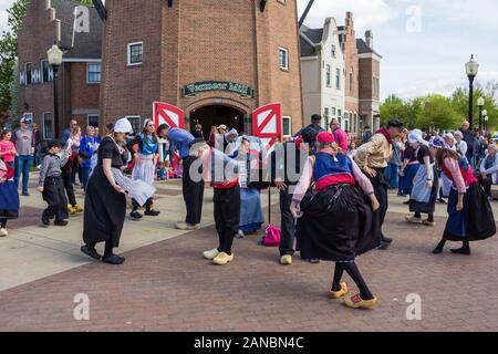 May 2, 2019, Pella, Iowa, USA. Folk dance in national dutch costume during the Tulip Time Festival Parade of Pella's dutch community Stock Photo