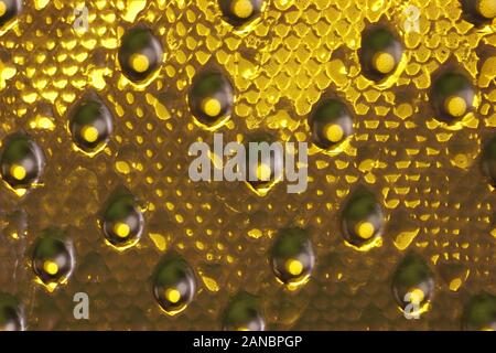 abstract colour image showing scattered light through textured glass Stock Photo