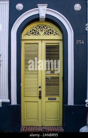 A very colorful door and entry into a building in Old San Juan that caught my color wandering eyes during an early quiet and peaceful morning stroll. Stock Photo