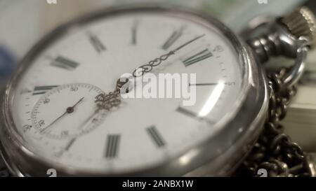 Pocket watch dial close-up, time flying by, history and heritage, memories Stock Photo