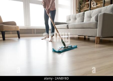 Barefoot Girl Doing House Cleaning Using Microfiber Wet Mop Pad High-Res  Stock Photo - Getty Images