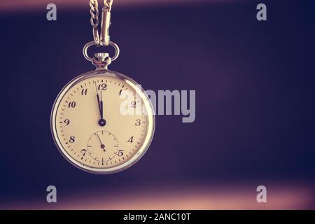 Time Passing Concept. Old Pocket Watch. Deadline, Running Out of Time and Urgency. Stock Photo