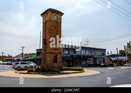 View of the War Memorial Clock Tower, made of sandstone and with a four faced clock, in Coonabarabran, New South Wales, Australia Stock Photo