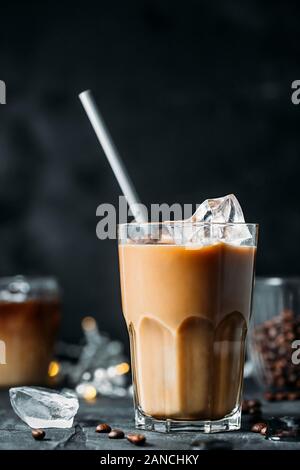 Iced coffee with milk in tall glass Stock Photo