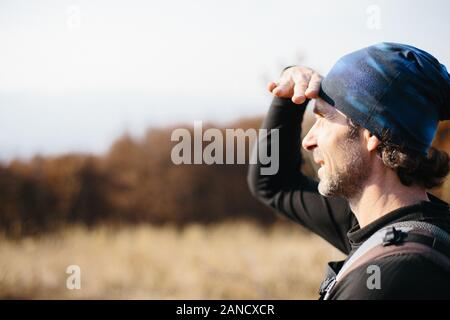 Mature man looking into the distance. Stock Photo