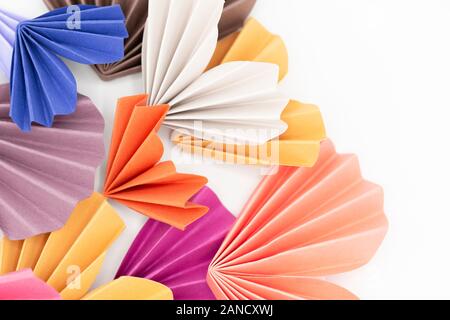 Close-up still life of multicolored paper hearts on white background Stock Photo