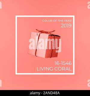 Seemless pattern of craft cardboard gift boxes on the solid pink background. Holiday and gift concept. Pop art slyle. Square. Living coral theme - color of the year 2019 Stock Photo