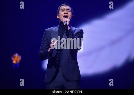 --FILE--Chinese actor Han Dongjun, also known as Elvis Han, sings at the stage of 2018 China TV Drama Awards in Beijing, China, 12 December 2018. *** Stock Photo