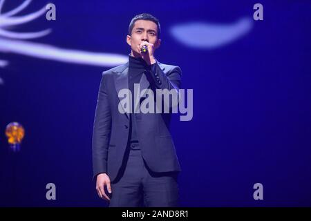 --FILE--Chinese actor Han Dongjun, also known as Elvis Han, sings at the stage of 2018 China TV Drama Awards in Beijing, China, 12 December 2018. *** Stock Photo