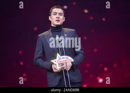 --FILE--Chinese actor Han Dongjun, also known as Elvis Han, sings at the stage of 2018 China TV Drama Awards in Beijing, China, 12 December 2018. *** Stock Photo