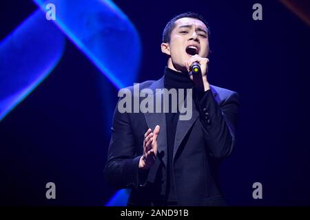 --FILE--Chinese actor Han Dongjun, also known as Elvis Han, sings at the stage of 2018 China TV Drama Awards in Beijing, China, 12 December 2018. *** Stock Photo