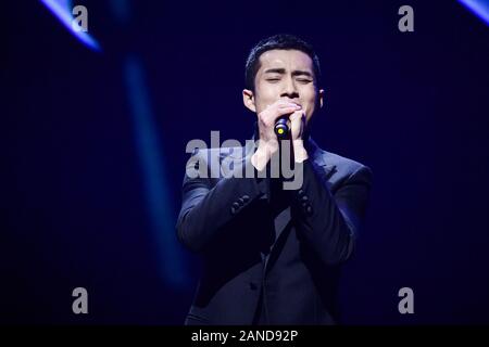 --FILE--Chinese actor Han Dongjun, also known as Elvis Han, sings at the stage of 2018 China TV Drama Awards in Beijing, China, 12 December 2018. *** Stock Photo