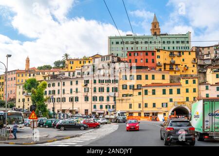 The town center of Ventimiglia, Italy on the Italian Riviera, with the colorful hillside homes and cathedral above. Stock Photo