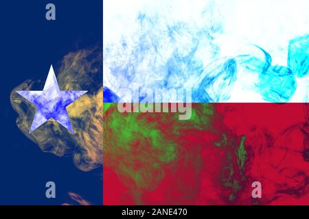 The national flag of the US state Texas in against a gray smoke on the day of independence in different colors of blue red and yellow. Political and r Stock Photo