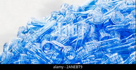 PET Preform ; Work in process before plastic bottle  blowing process ; industrial food and drink engineering background Stock Photo