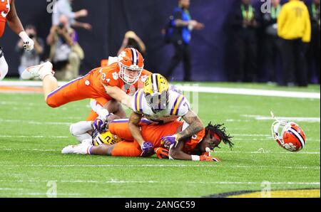 Clemson Tigers wide receiver Justyn Ross (8) loses his helmet while getting tackled against the LSU Tigers during the NCAA College Football Playoff national championship game Monday, Jan. 13, 2020, in New Orleans. LSU defeated Clemson 42-25. (Photo by IOS/ESPA-Images) Stock Photo