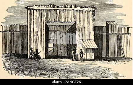 The soldier's story of his captivity at Andersonville, Belle Isle, and other Rebel prisons . VIEW OF THE BLOODHOUNDS.And the Hut in which they were kept. There was not only a large pack kepthere, but several other packs kept in the vicinity, for the purpose of recaptur-ing escaped prisoners. They said prisoners tried to escape sometimes, but the dogsalways caught them. Page 72.. VIEW OF THE MAIN GATE. As we waited, the great gates of the prison swung on theirponderous oaken hinges, and we were ushered into what seemedto us Hades itself. Page 72. DESPONDENCY AND GLOOM. 73 on their ponderous oak Stock Photo