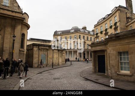 BATH, UK - APRIL 10, 2019. Winding streets of Bath with Thermae Bath Spa and Hetling Court buildings. Bath, England, UK, April 10, 2019 Stock Photo